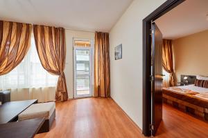 Postel nebo postele na pokoji v ubytování Guest House Oasis