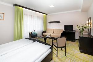 Ein Bett oder Betten in einem Zimmer der Unterkunft Hotel Zátiší
