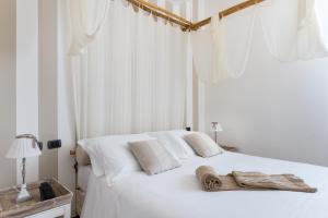 Postelja oz. postelje v sobi nastanitve Hotel Borgo Pantano
