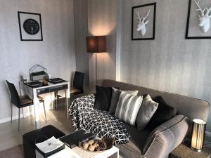 Area soggiorno di Stay in Style at Oasis