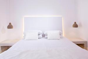 Posteľ alebo postele v izbe v ubytovaní Art Hotel Santorini