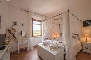 Postel nebo postele na pokoji v ubytování Le Tartarughe rooms