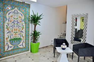 Posezení v ubytování City Hotel Alger