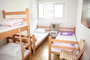 Postel nebo postele na pokoji v ubytování Hostel Jellostone