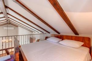 Postel nebo postele na pokoji v ubytování Hilltop Apartment Vidovici