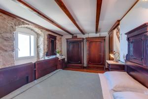 Postel nebo postele na pokoji v ubytování Hilltop Apartment Vidovici