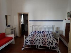 Postel nebo postele na pokoji v ubytování Villa Teseo