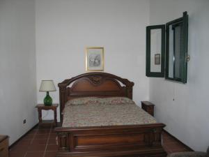 Postel nebo postele na pokoji v ubytování Villa Teseo