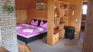 Ein Bett oder Betten in einem Zimmer der Unterkunft Haus Läsker - Sächsische Schweiz