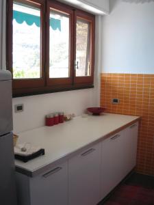 Kuchyň nebo kuchyňský kout v ubytování Profumi di Mare