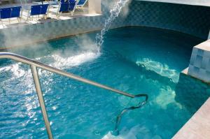 a pool of water with a snake in it at Hotel Regina del Mare in Ischia