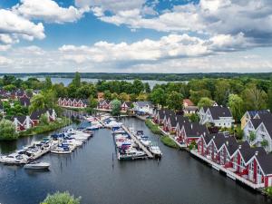 an aerial view of a marina with boats in the water at Premium Apartments in Wendisch Rietz