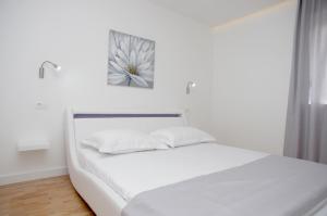 Posteľ alebo postele v izbe v ubytovaní Besker Apartment