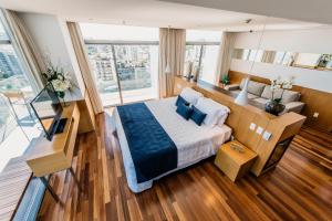 Postel nebo postele na pokoji v ubytování H Niteroi Hotel