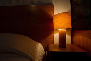 Cama ou camas em um quarto em Casa de Pedra