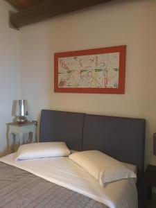 Postel nebo postele na pokoji v ubytování Oreste Suite