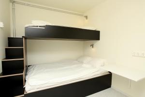 Postel nebo postele na pokoji v ubytování Citysleep