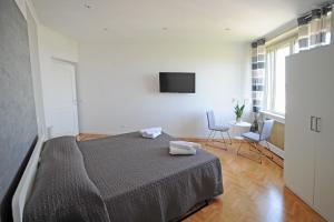 Кровать или кровати в номере Guest House Vignola