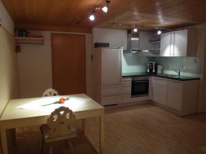 Kuchyň nebo kuchyňský kout v ubytování Gästehaus Appartements Egender
