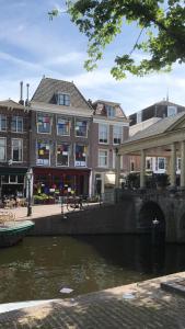 a bridge over a river in a city at NR22 Leiden in Leiden
