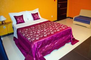 En eller flere senge i et værelse på Apartments Villa Sunrise + 41 billeder