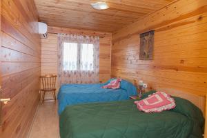 A bed or beds in a room at Casa Rural los Caños