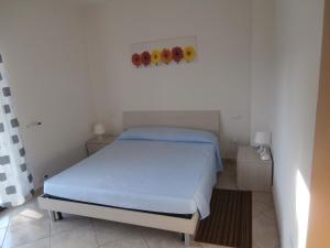 Una cama o camas en una habitación de Donizetti Apartment 7