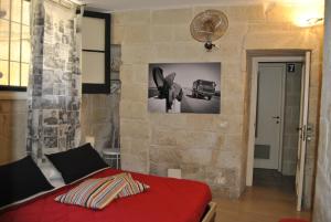 Postel nebo postele na pokoji v ubytování White Suite B&B