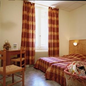 Ліжко або ліжка в номері Residence des Domes
