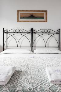 Postel nebo postele na pokoji v ubytování Hotel Mercanti di Mare