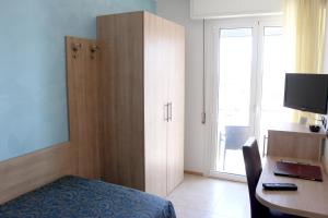 TV a/nebo společenská místnost v ubytování Hotel Levante