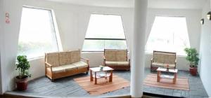 Predel za sedenje v nastanitvi DM Hoteles Cusco