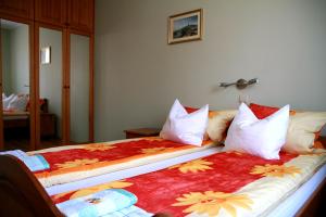 Łóżko lub łóżka w pokoju w obiekcie Apartamenty Klemens