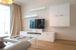 Sjónvarps- og/eða afþreyingartæki á Sofie Apartments