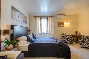 A bed or beds in a room at Hansalinn