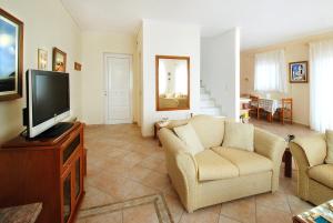 A television and/or entertainment centre at Villa Sunset