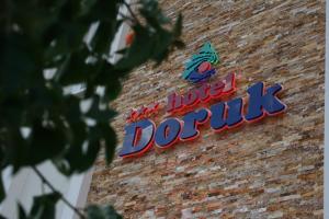 Certifikát, hodnocení, plakát nebo jiný dokument vystavený v ubytování Hotel Doruk