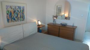 A bed or beds in a room at Villa Sunset