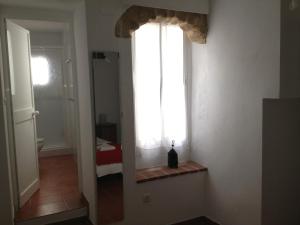 Posteľ alebo postele v izbe v ubytovaní Apartamentos Casa la Costanilla