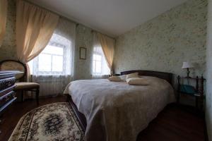  Кровать или кровати в номере Boutique Apartments Pokrovka 9A 