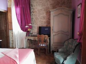 TV a/nebo společenská místnost v ubytování Hotel Boutique Bodegas De Arnes - Adults Only