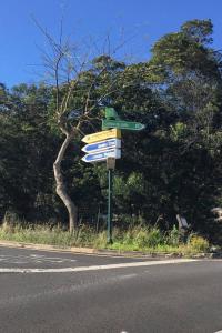 a street sign on the side of a road at Casa do Moinho in Santa Cruz