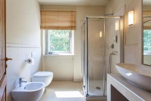 Phòng tắm tại Villa Borgo Duino