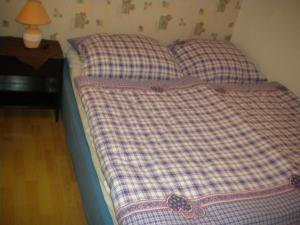 Postel nebo postele na pokoji v ubytování Penzion Oáza Hřensko
