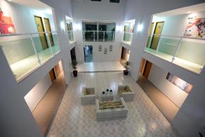 an overhead view of a building with some plants at Hotel Leon in Barbalha