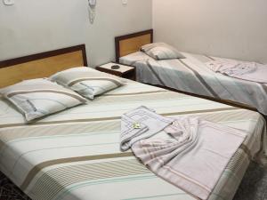Krevet ili kreveti u jedinici u objektu Hotel Ferreira Viana