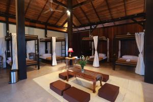 Ein Sitzbereich in der Unterkunft Kampung Canggu