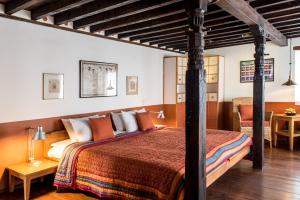 Postel nebo postele na pokoji v ubytování Milla Guesthouse Bhaktapur