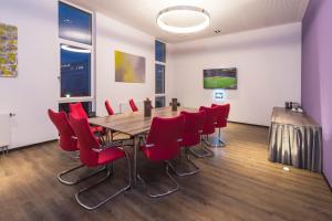 Uma TV ou centro de entretenimento em Star G Hotel Premium München Domagkstraße