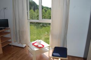TV a/nebo společenská místnost v ubytování Sofial Guesthouse